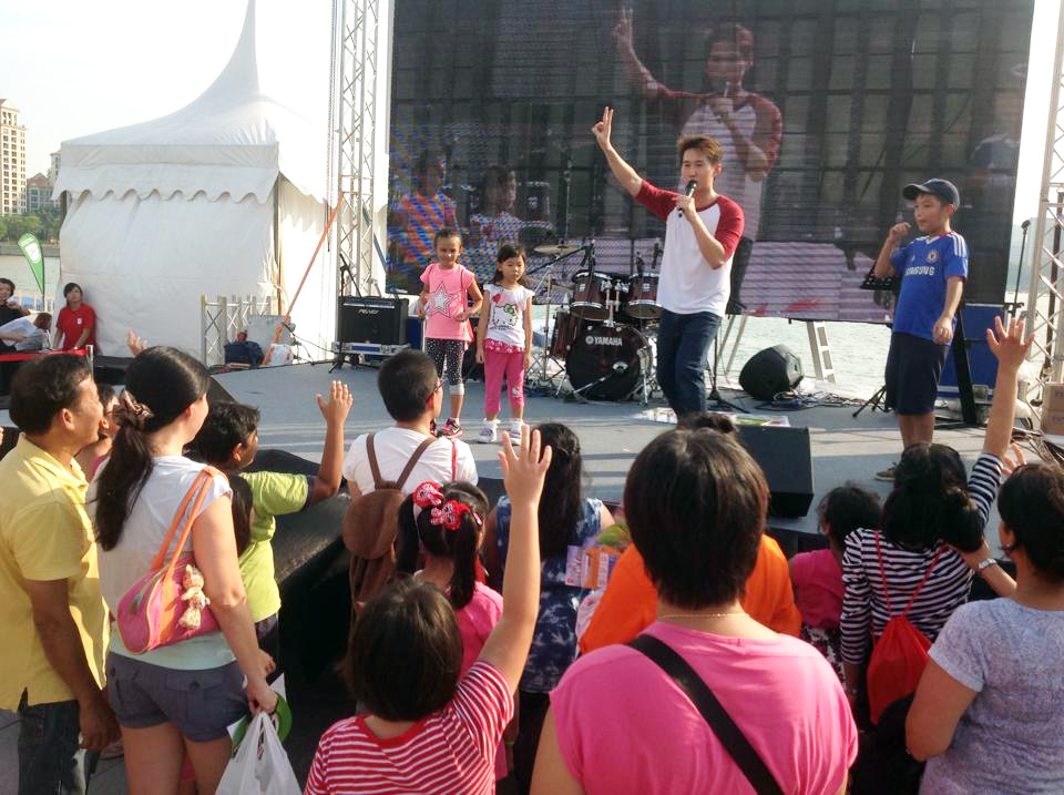 Jim Koh engaging the kids on stage